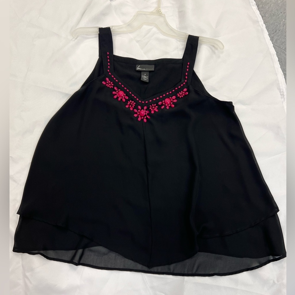Beautiful flowing, beaded, lined, blouse.